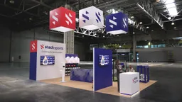 20x20 Island booth design by Reaction Space
